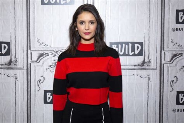 Nina Dobrev in Bathing Suit Has 